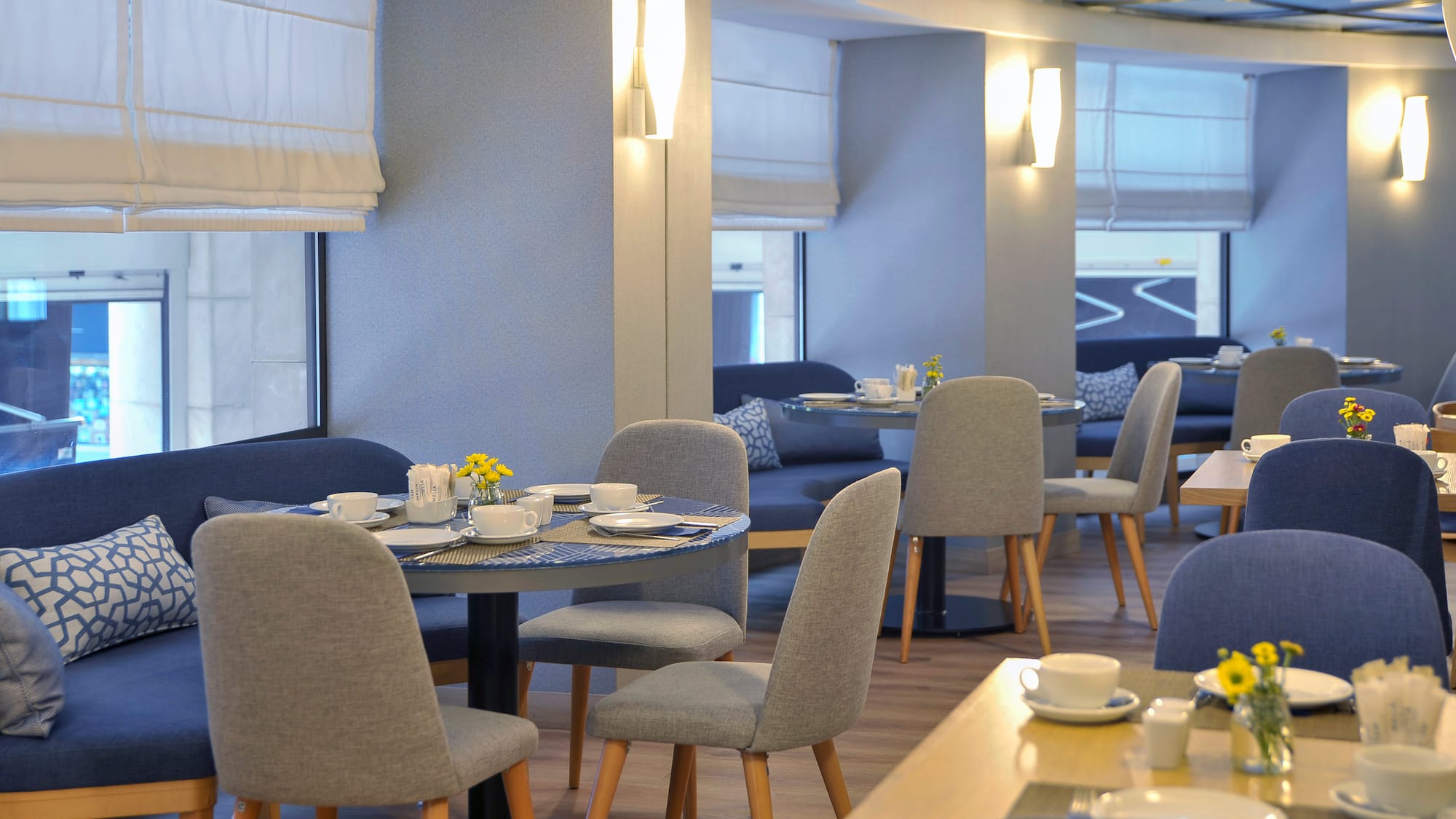 a room with tables and chairs