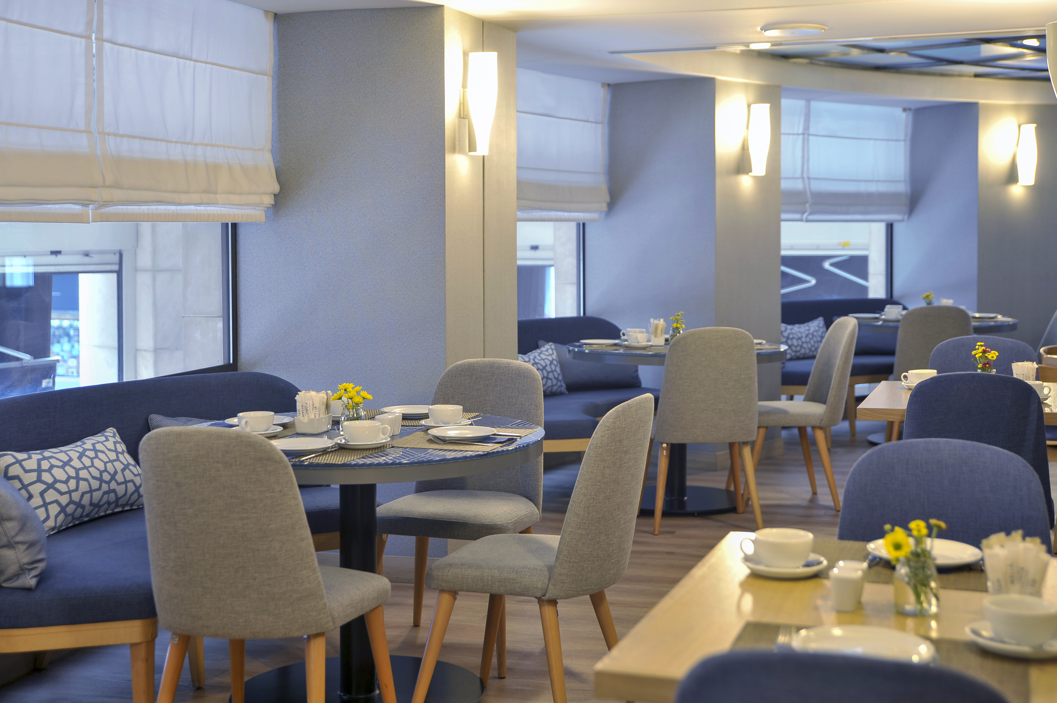 a room with tables and chairs