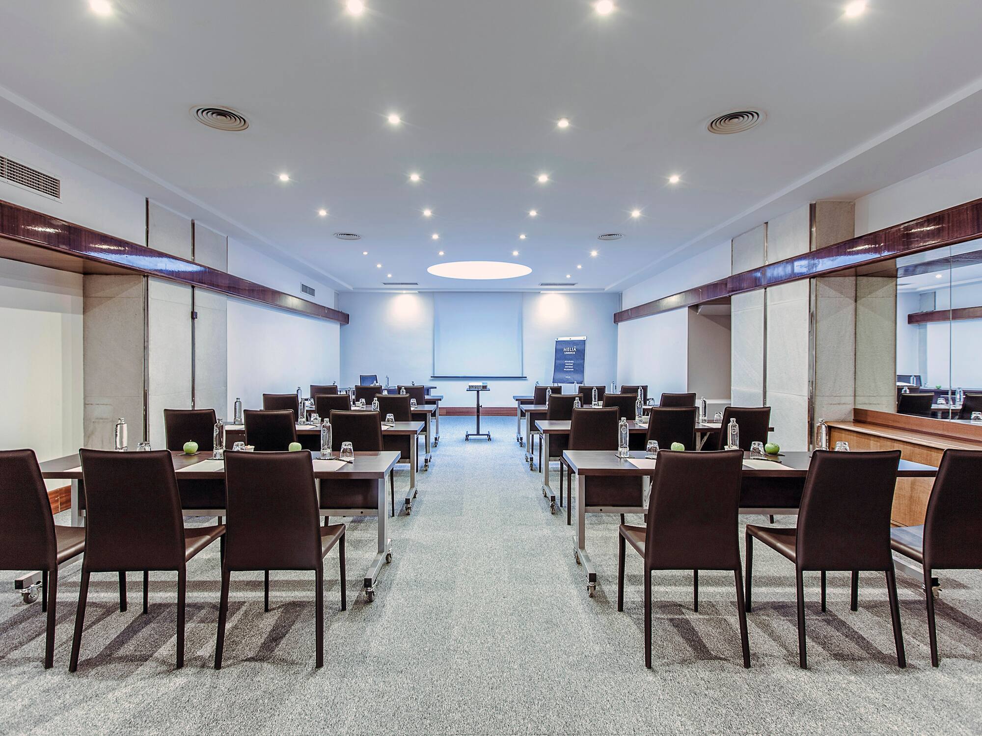 a room with tables and chairs