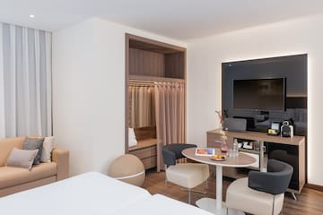 a room with a tv and a table