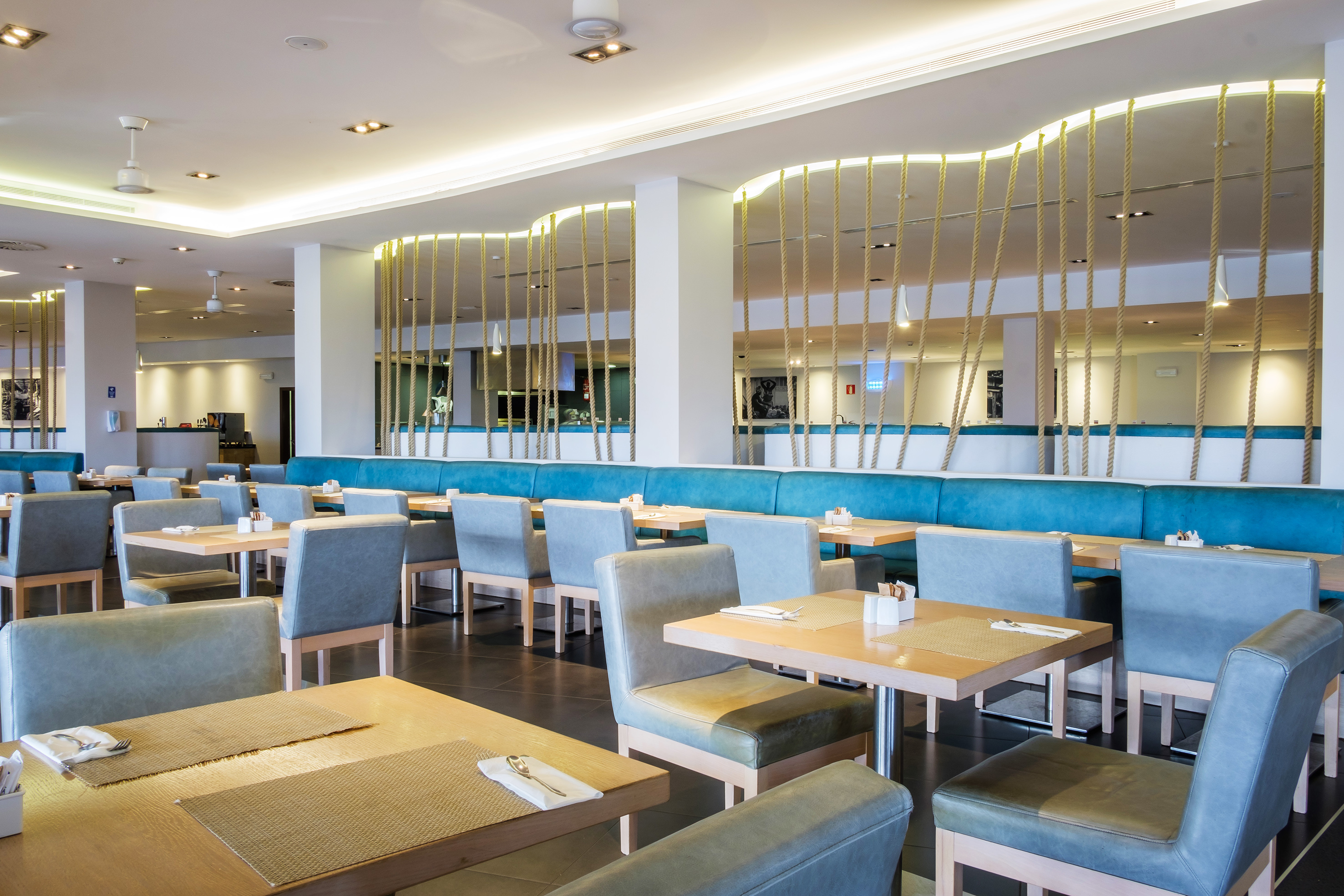 a restaurant with tables and chairs