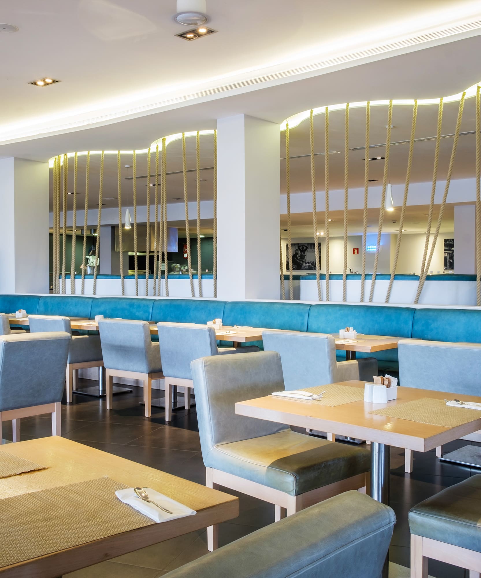 a restaurant with tables and chairs