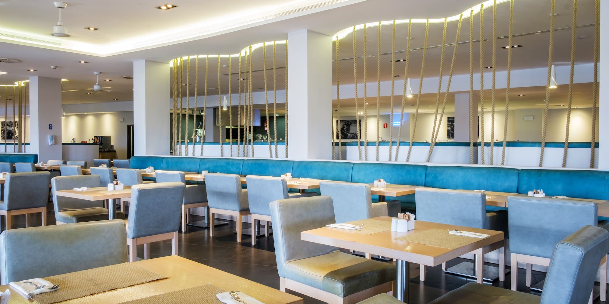 a restaurant with tables and chairs