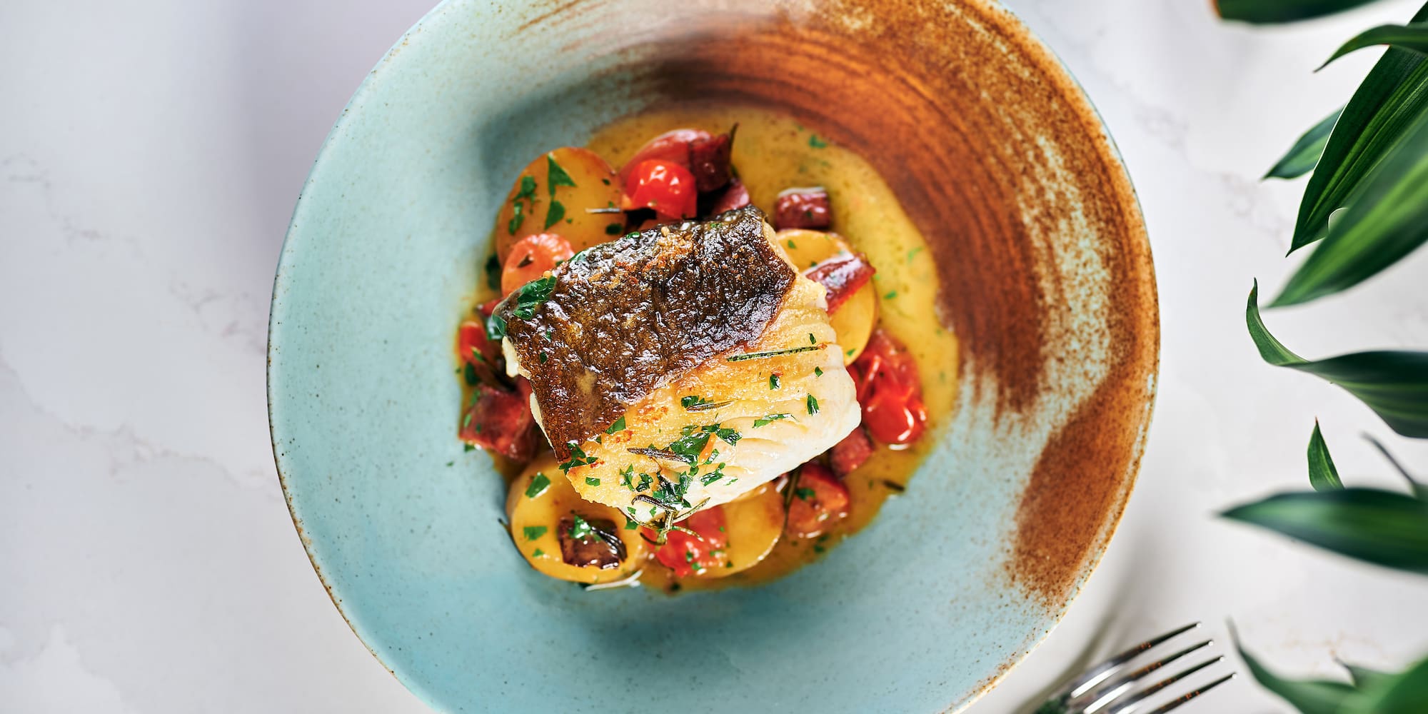 a plate of food with a fork and knife