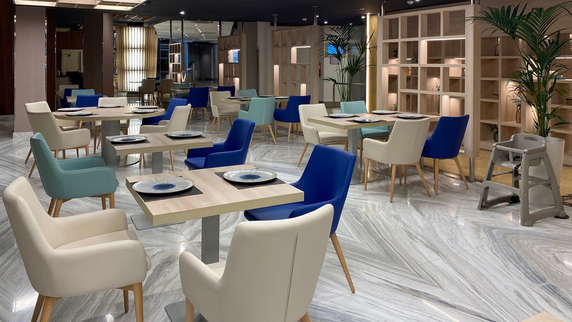 a room with tables and chairs