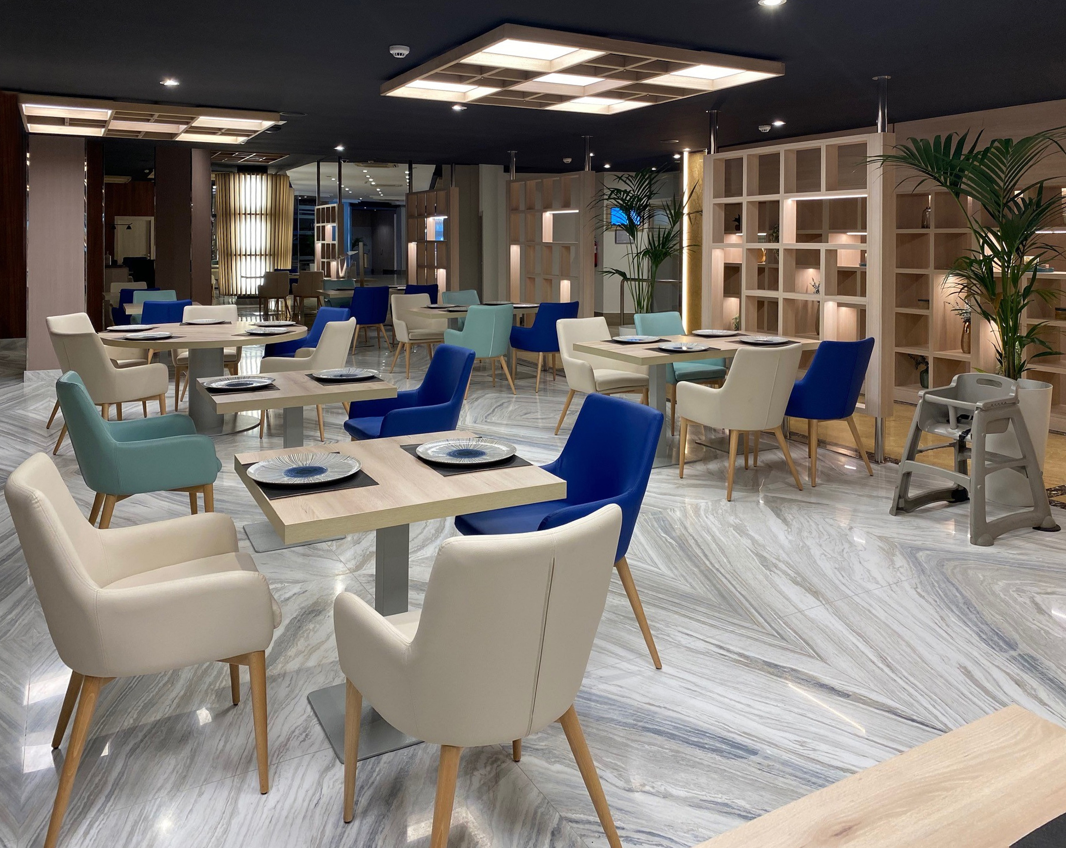 a room with tables and chairs