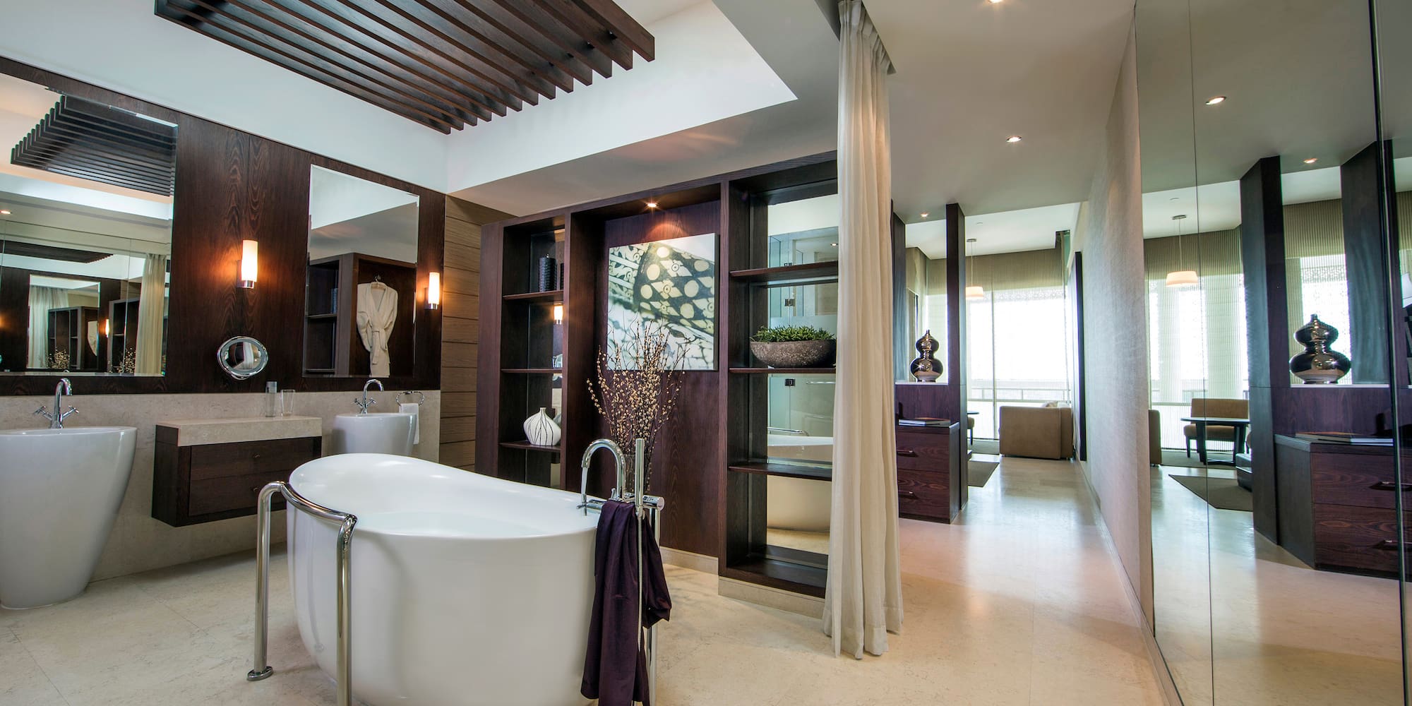 a bathroom with a tub and a shower