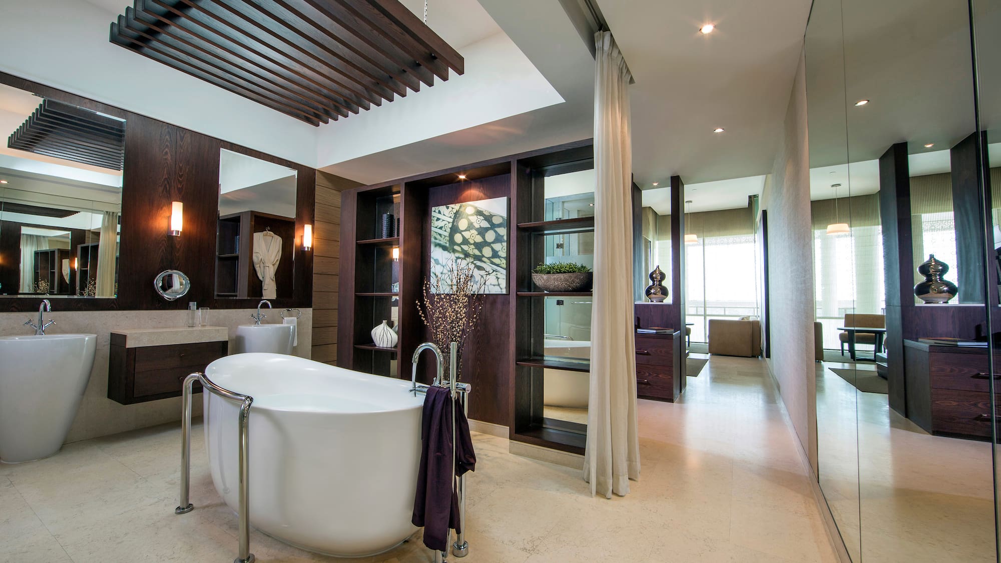 a bathroom with a tub and a shower