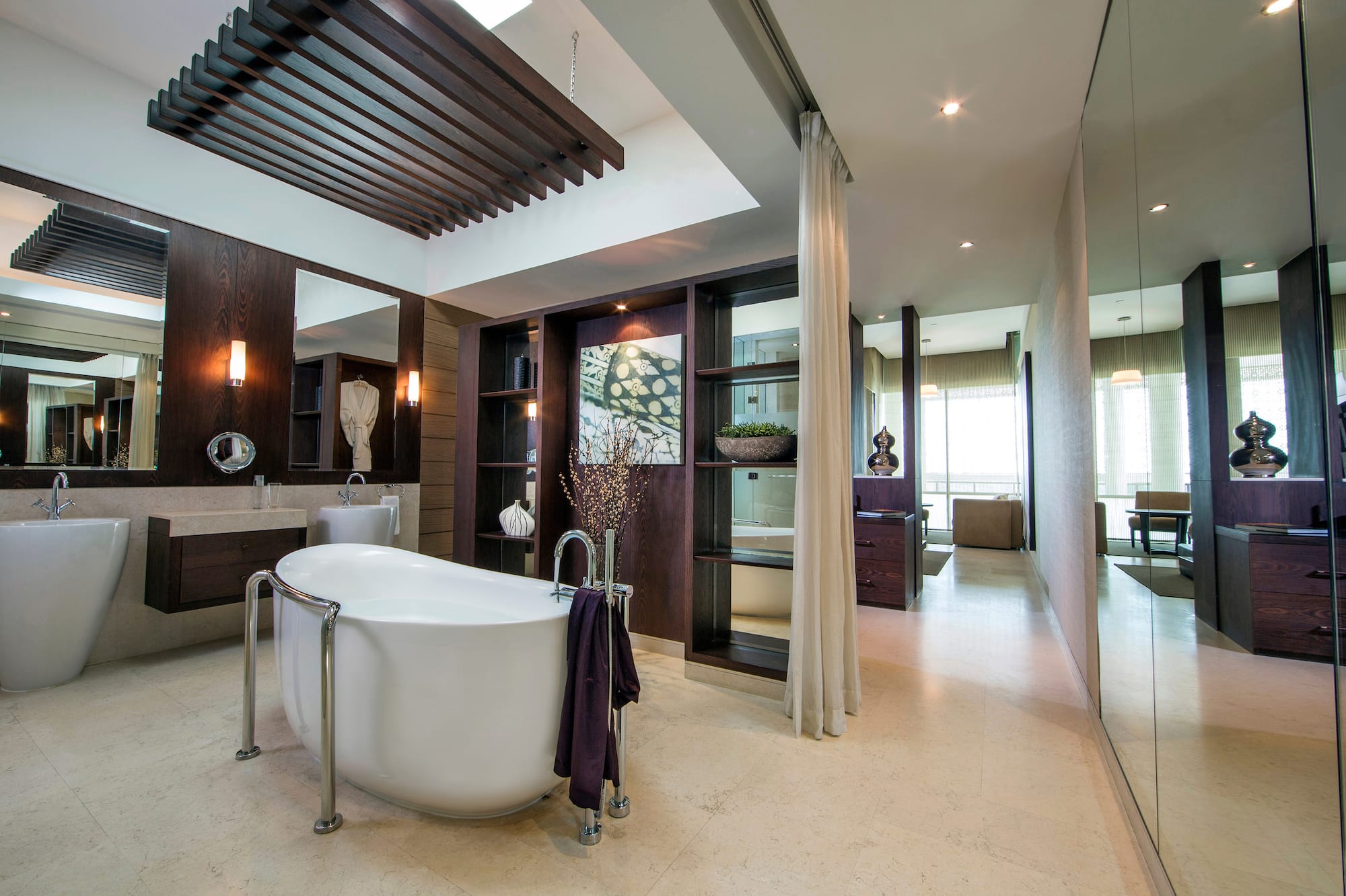 a bathroom with a tub and a shower
