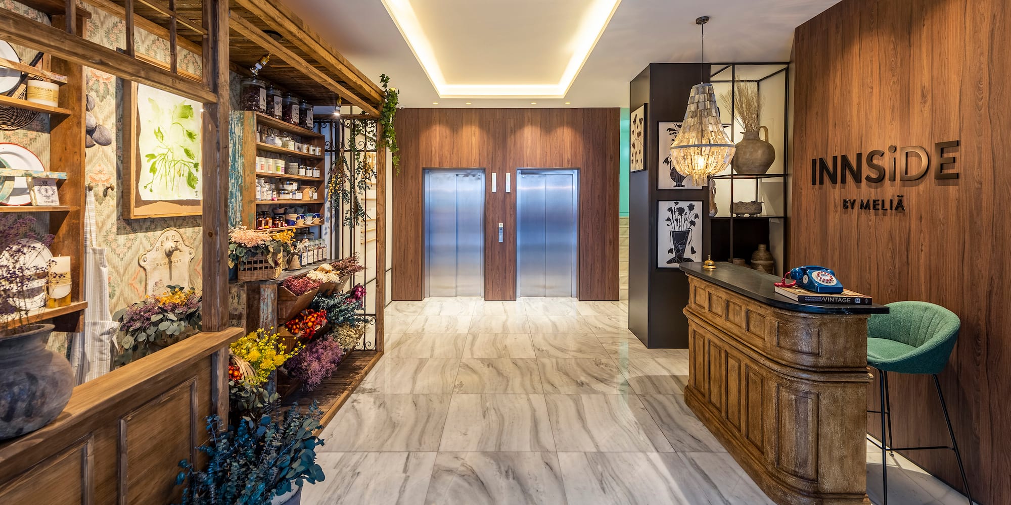 a lobby with a counter and elevator