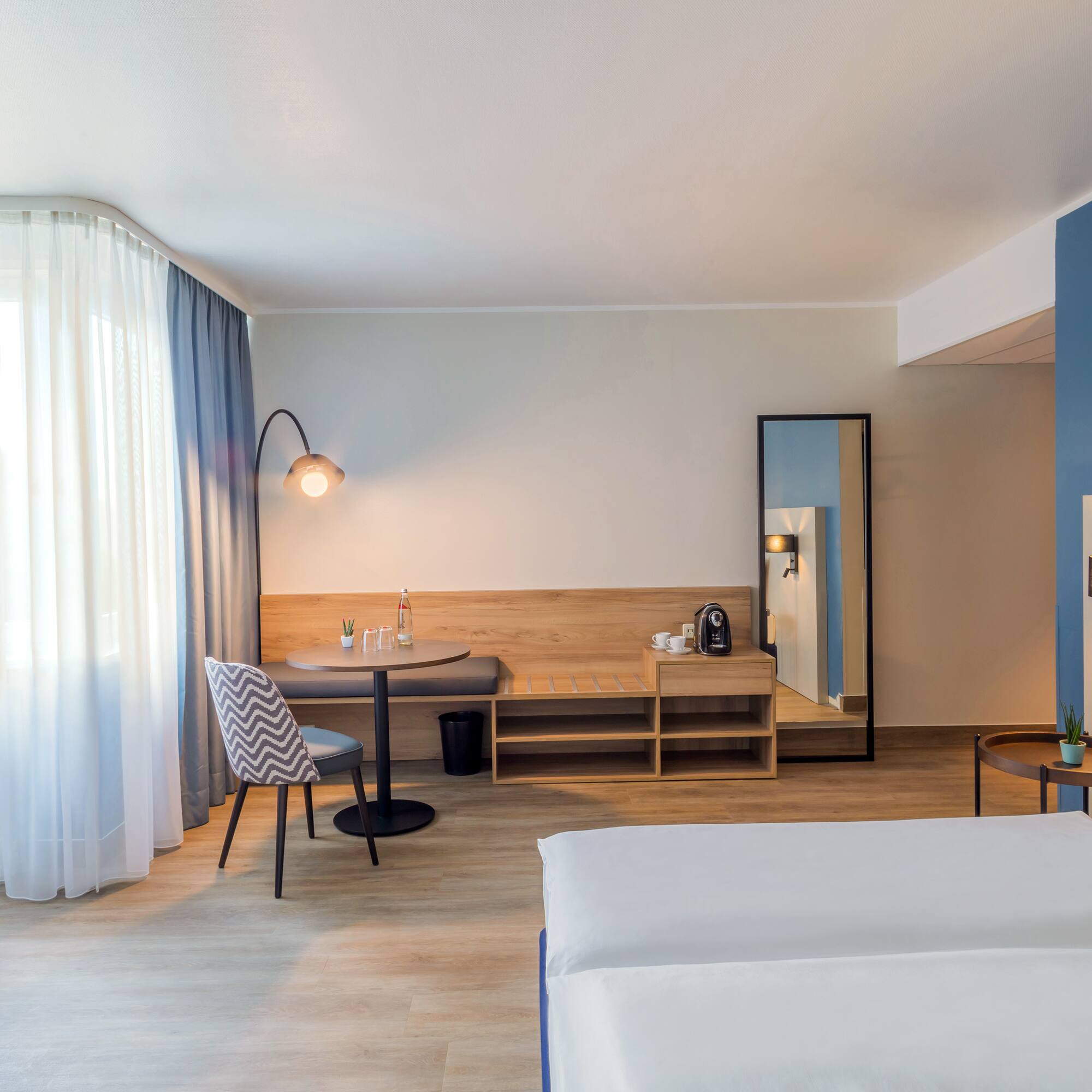 a room with a table and chairs