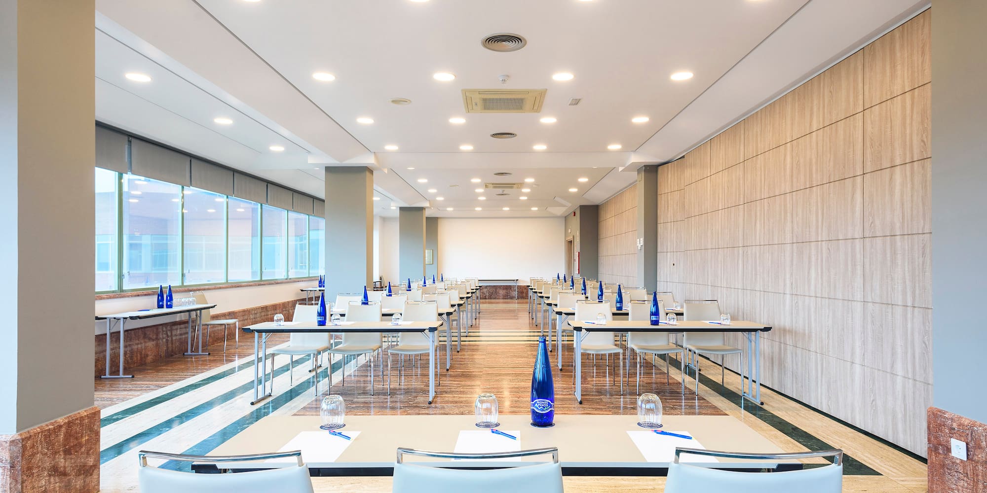 a room with tables and chairs