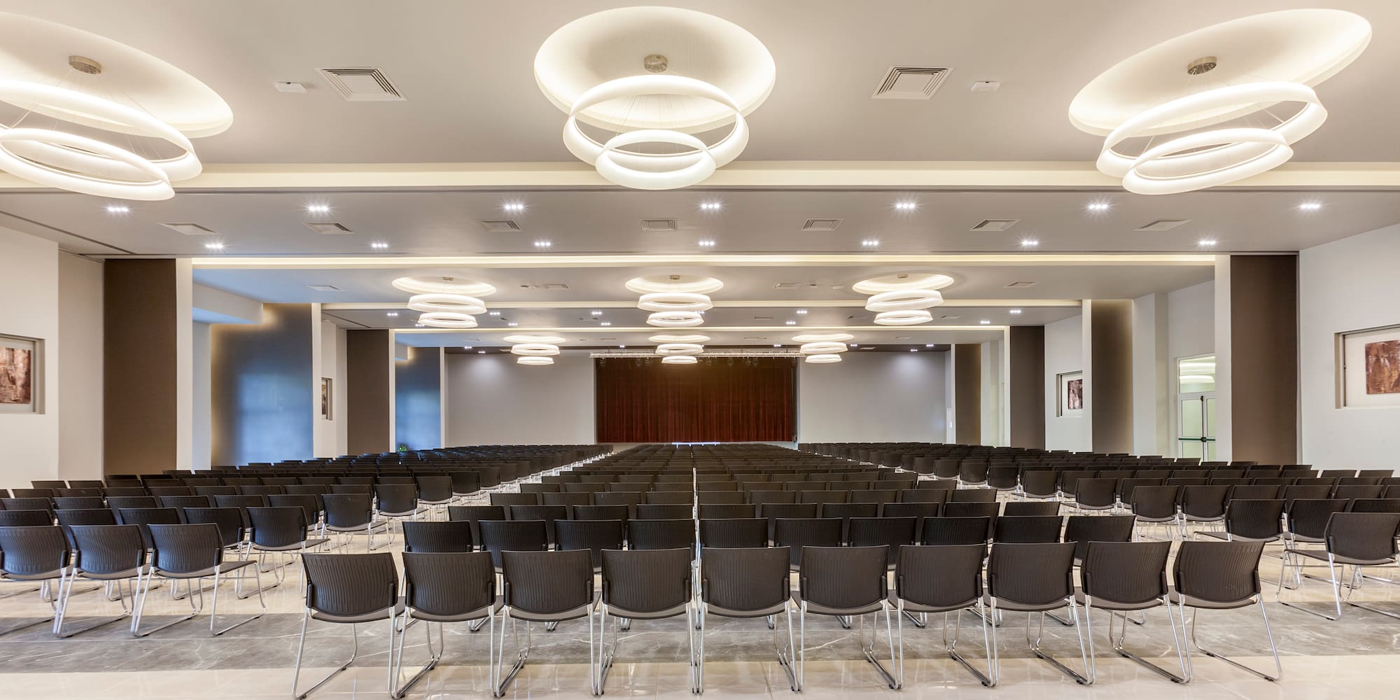 a room with rows of chairs