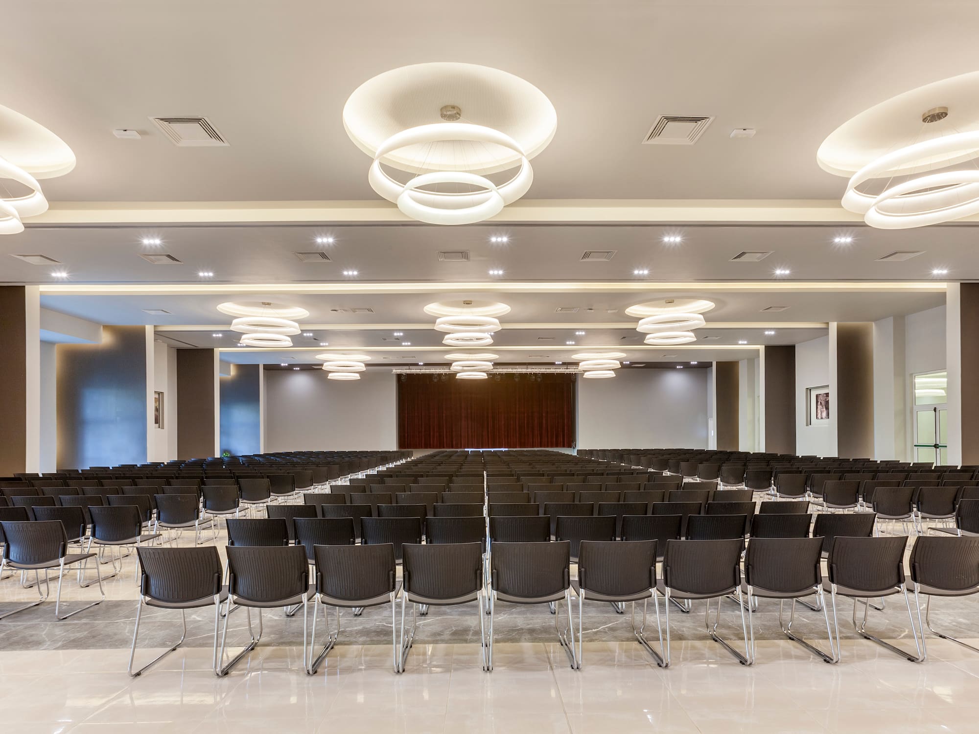 a room with rows of chairs