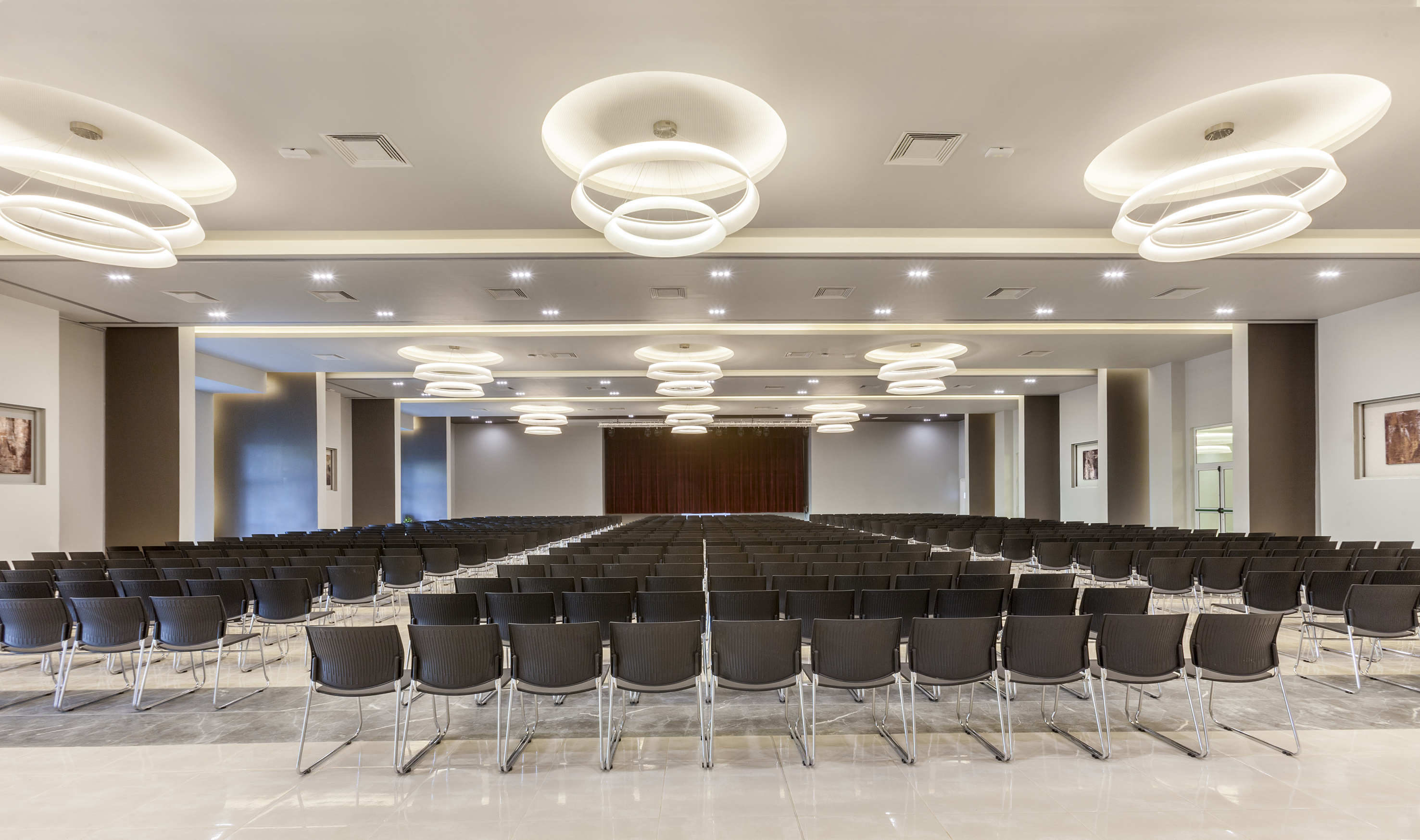a room with rows of chairs