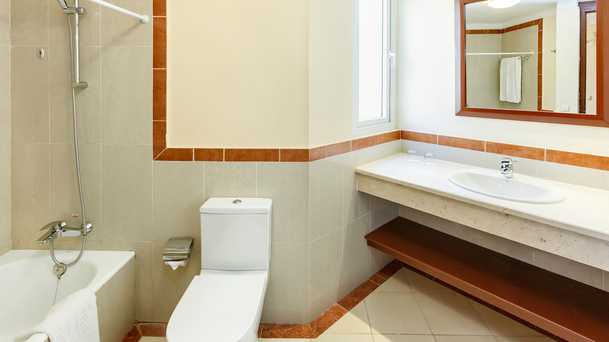 a bathroom with a sink and toilet