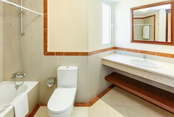 a bathroom with a sink and toilet