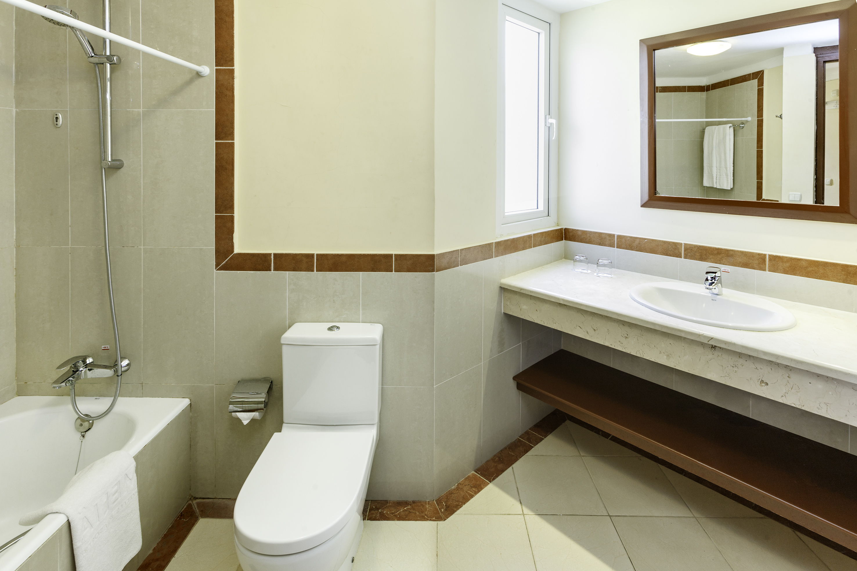 a bathroom with a sink and toilet