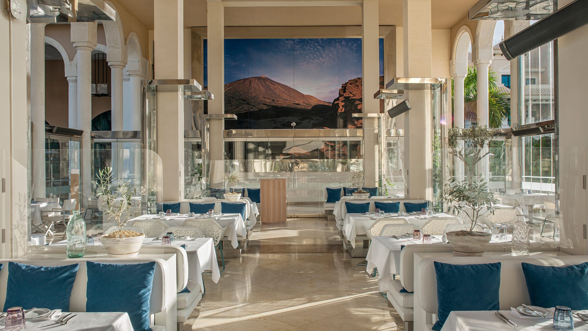 a room with tables and chairs