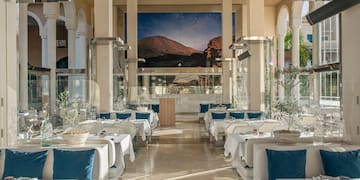 a room with tables and chairs