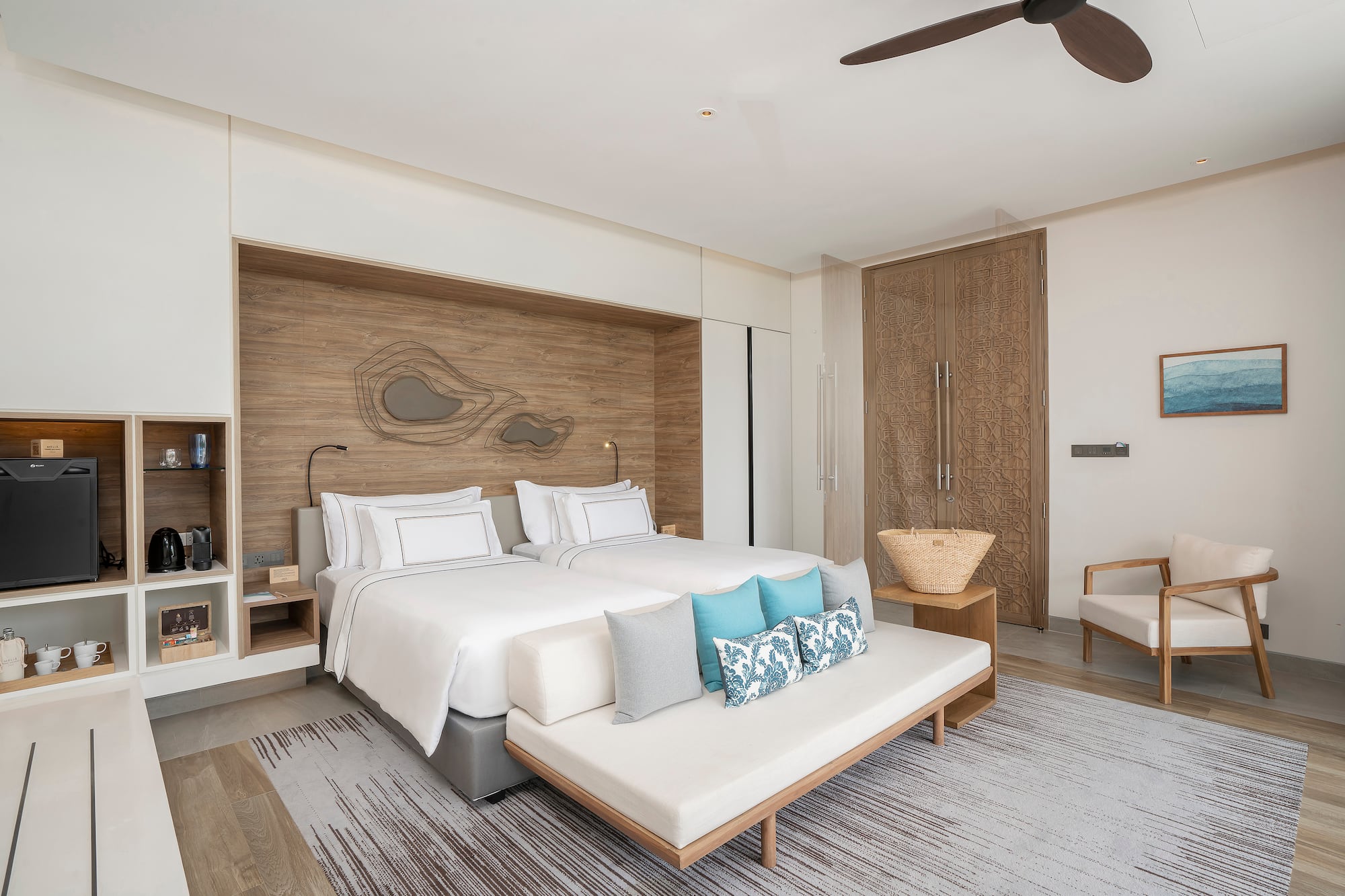 a bedroom with a bed and a fan