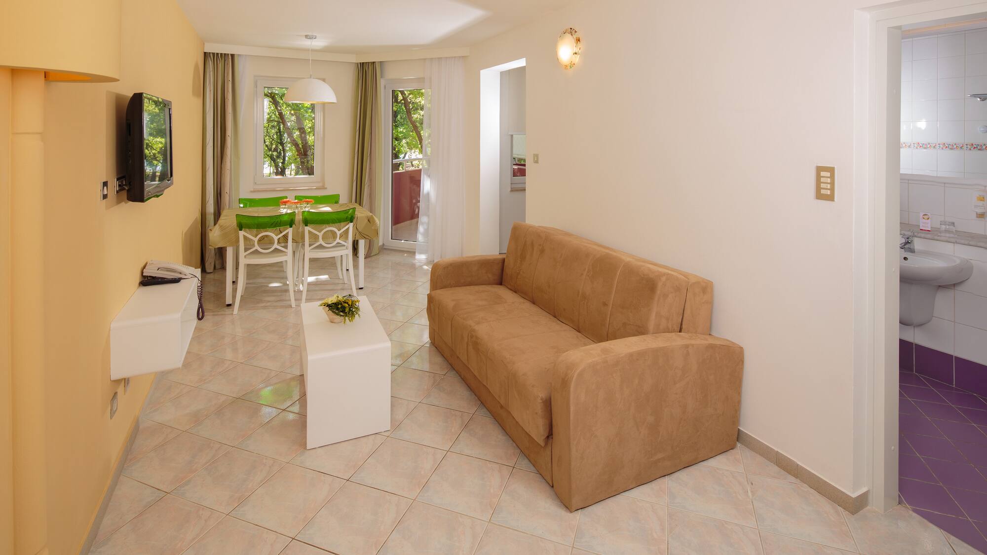 a living room with a couch and a table