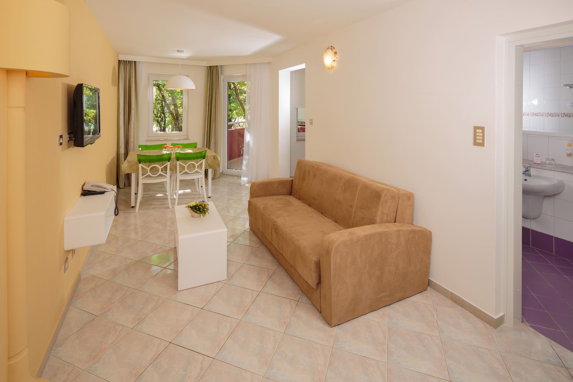 a living room with a couch and a table