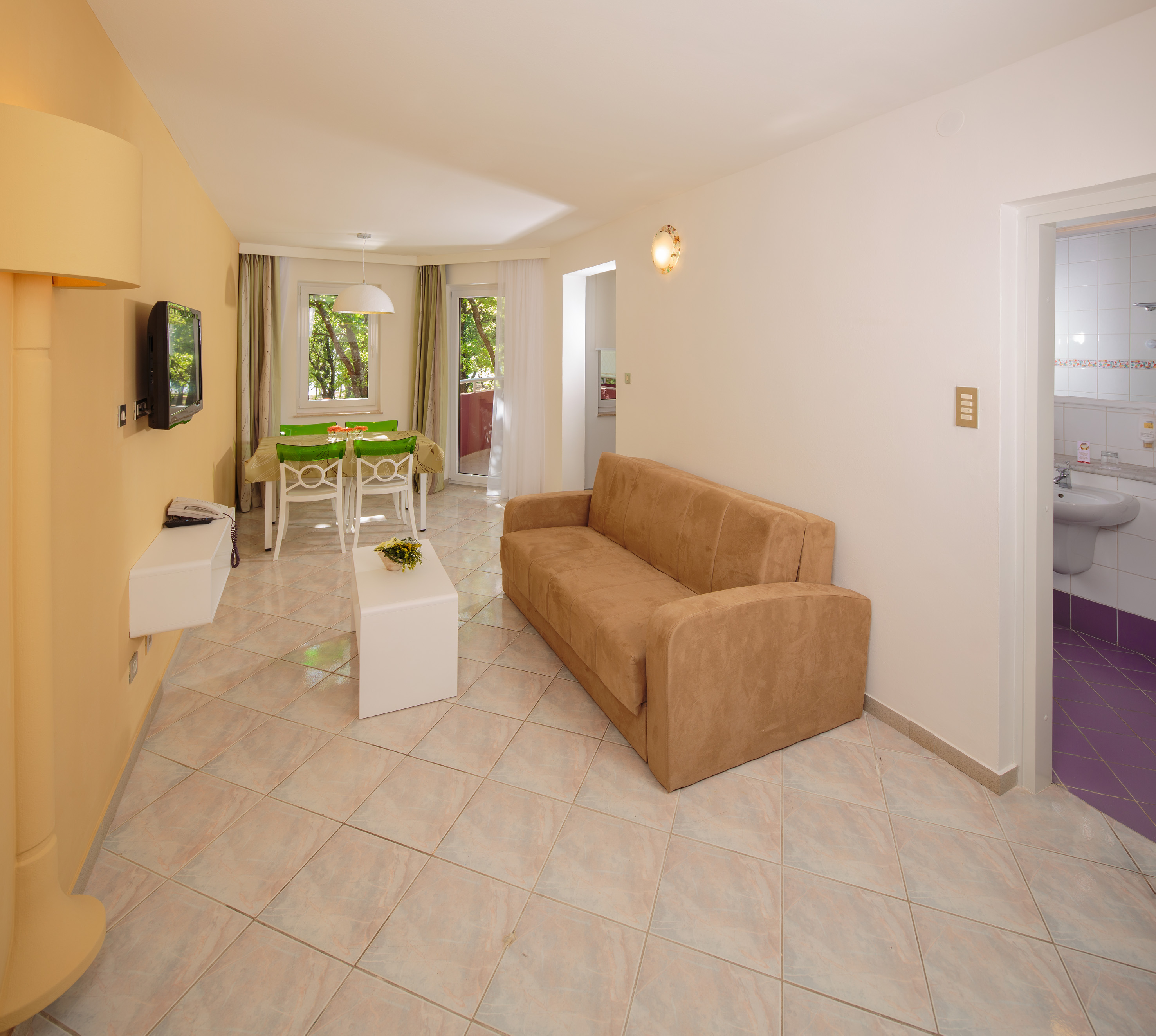 a living room with a couch and a table