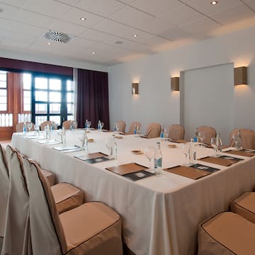 a large conference room with a table set up