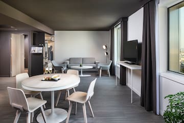 a room with a television and a table