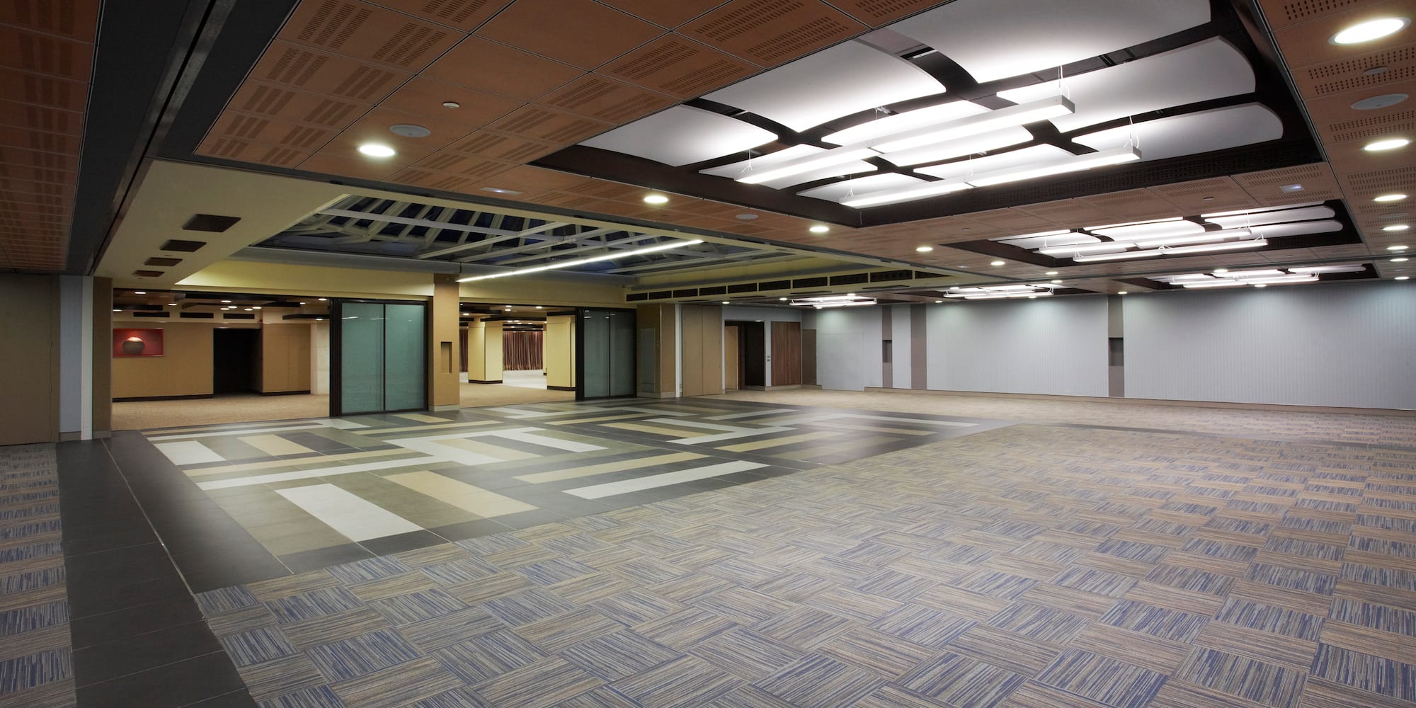 an empty room with a tile floor