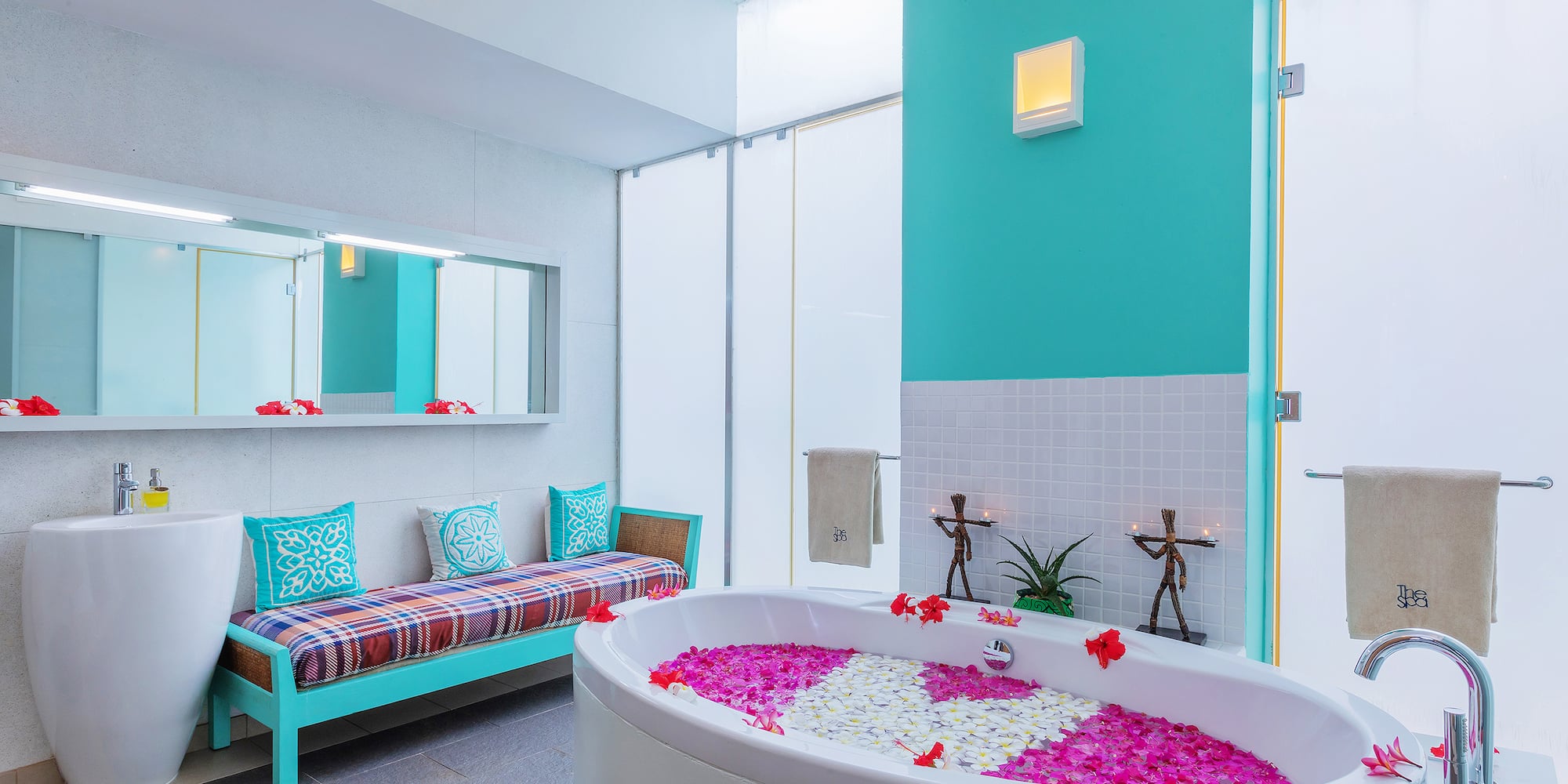 a bathtub with flowers in it