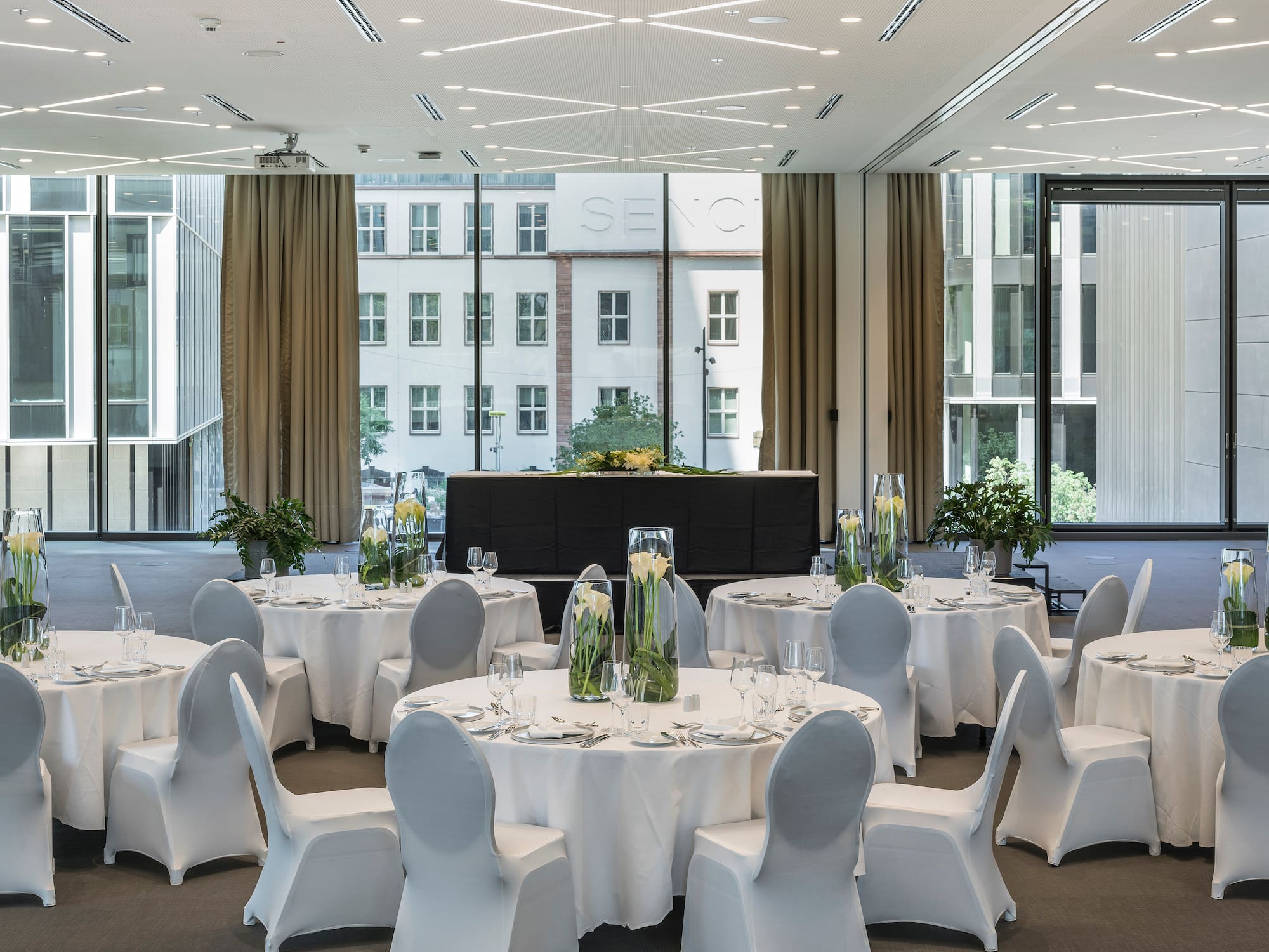 a room with tables and chairs