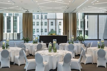 a room with tables and chairs