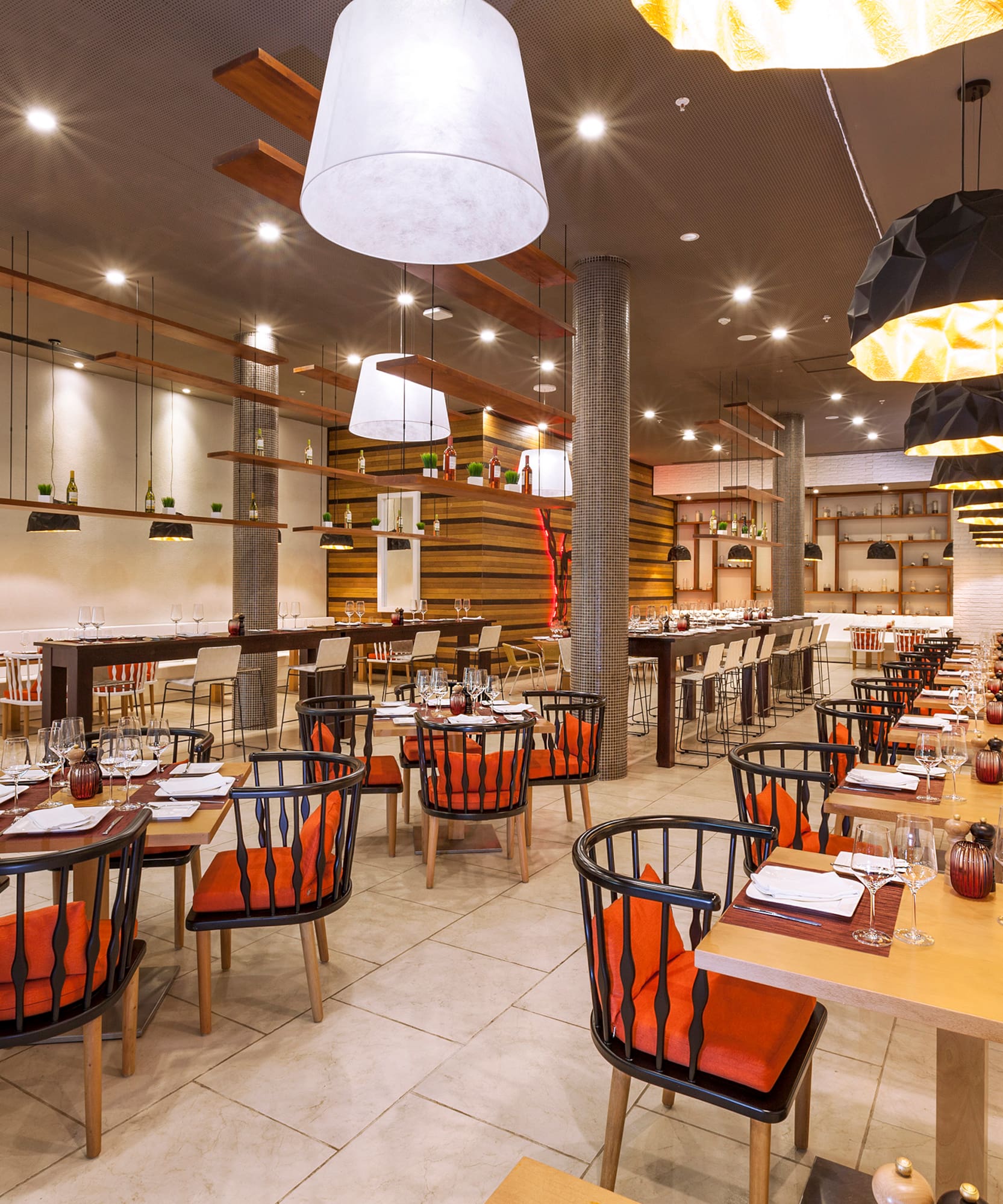 a restaurant with tables and chairs