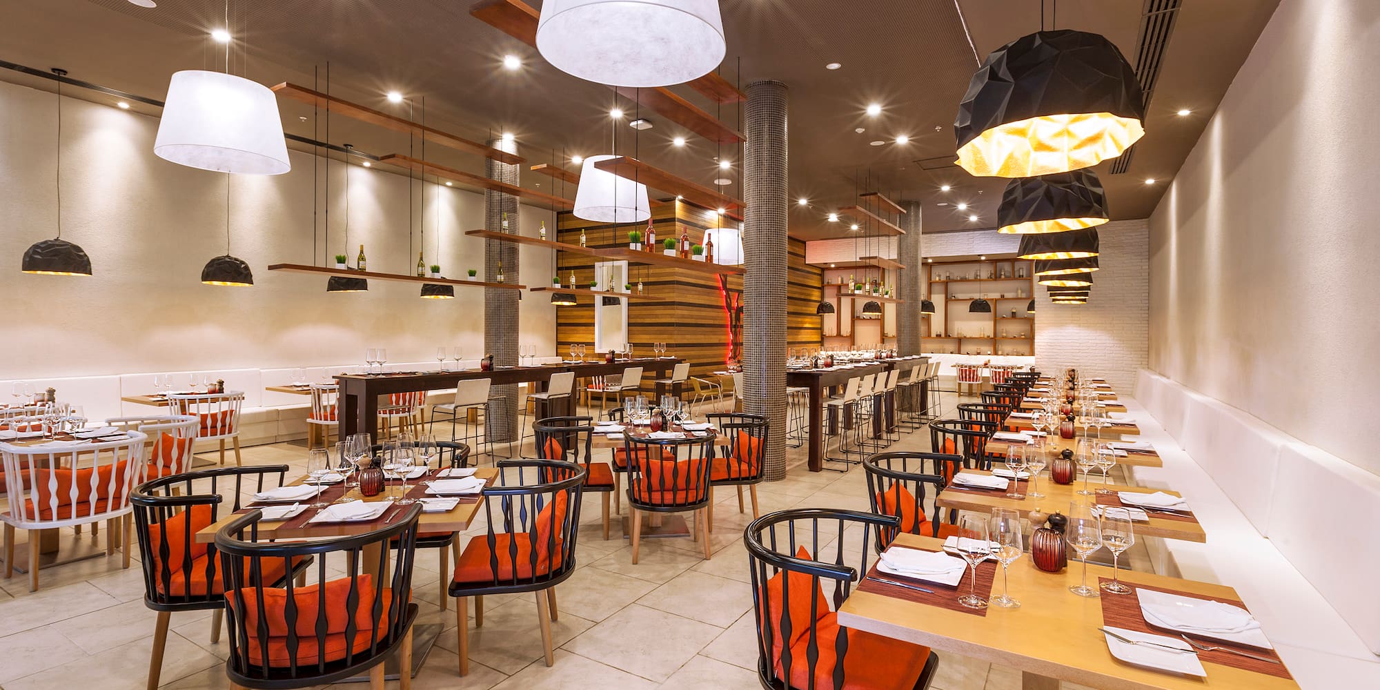 a restaurant with tables and chairs