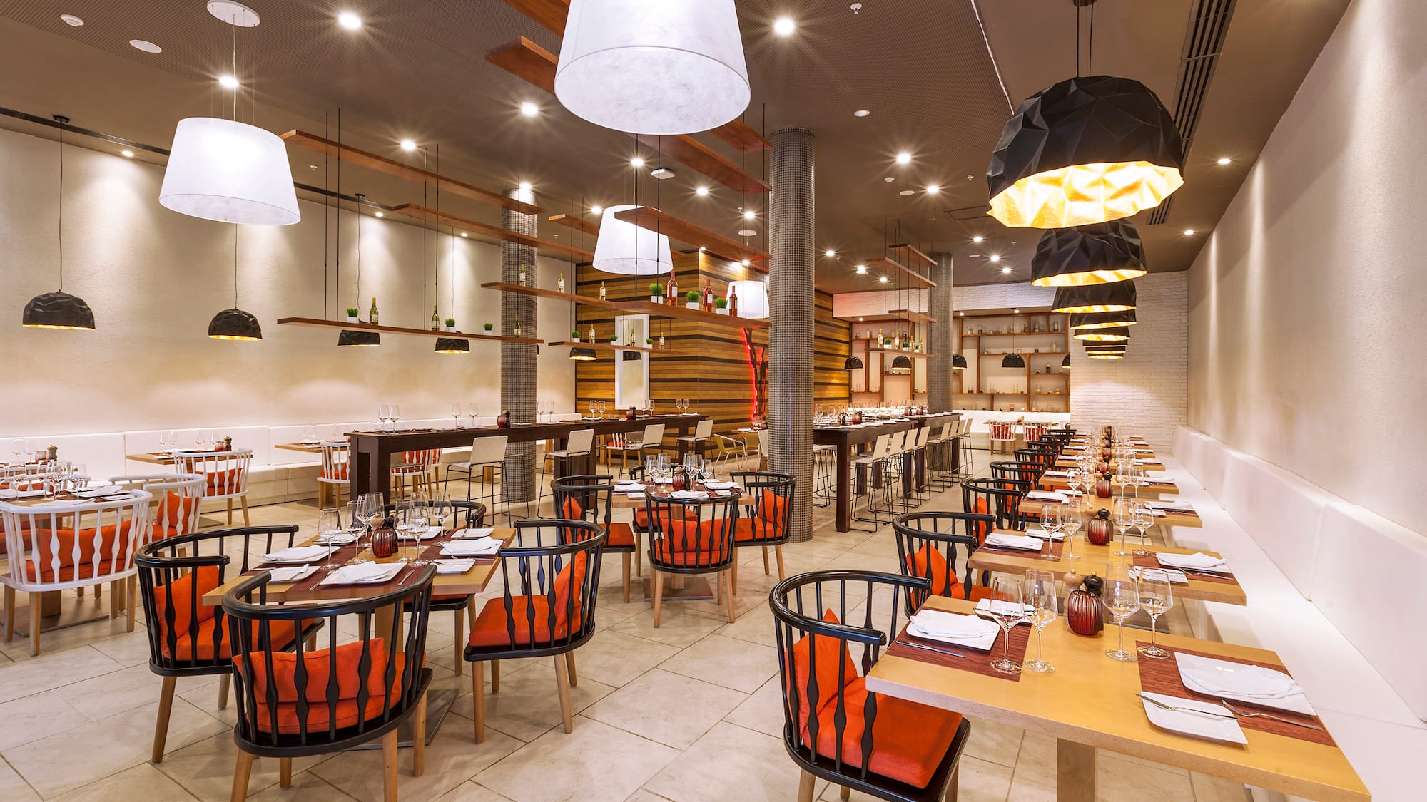 a restaurant with tables and chairs