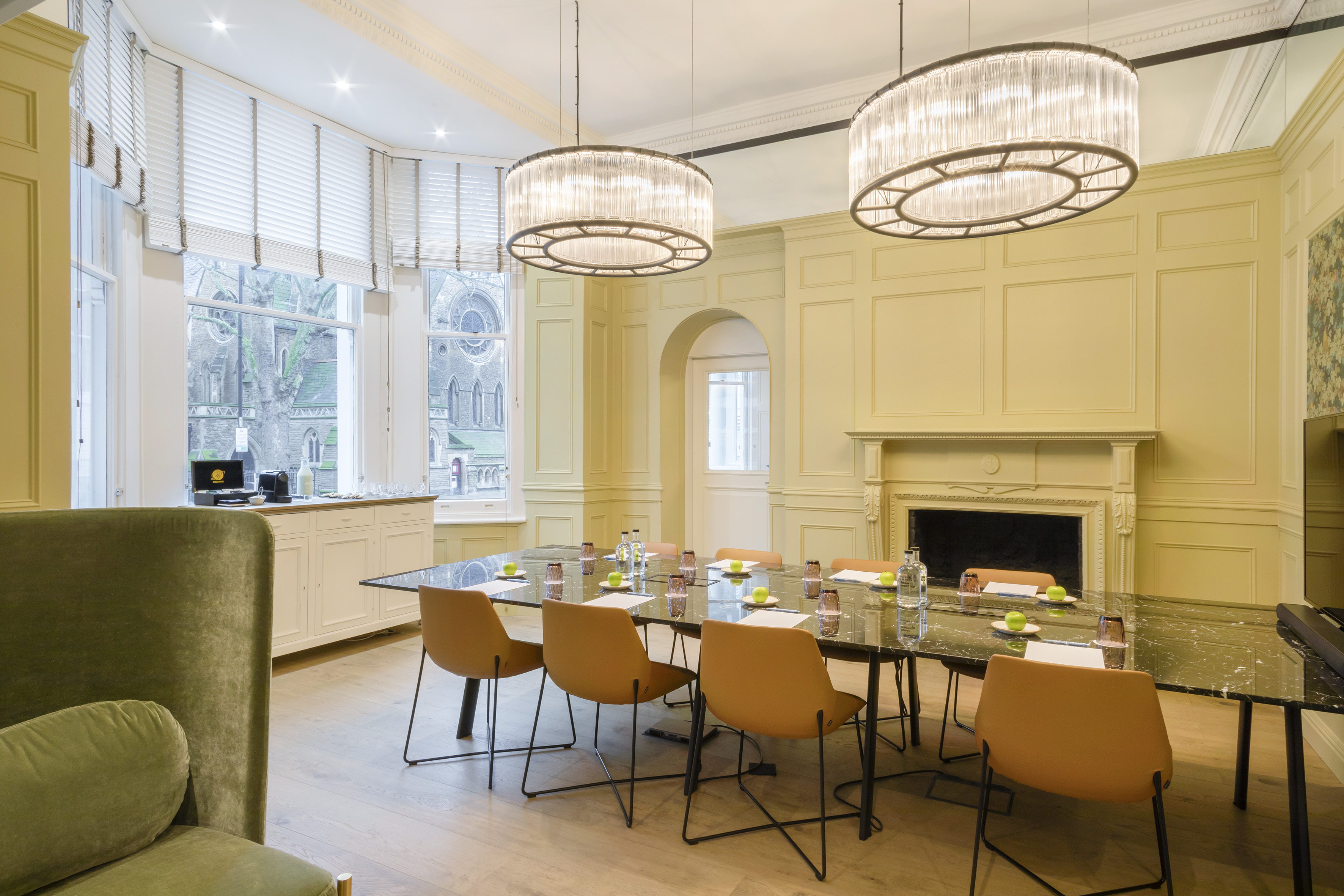 a room with a table and chairs