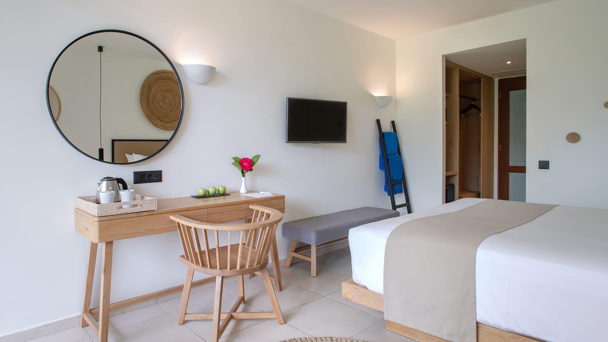 a room with a bed and a desk