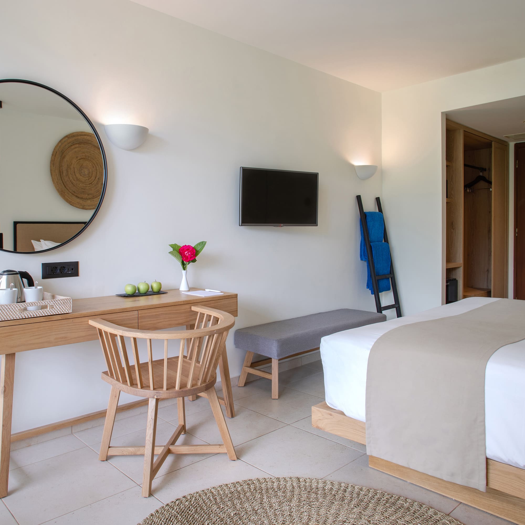 a room with a bed and a desk