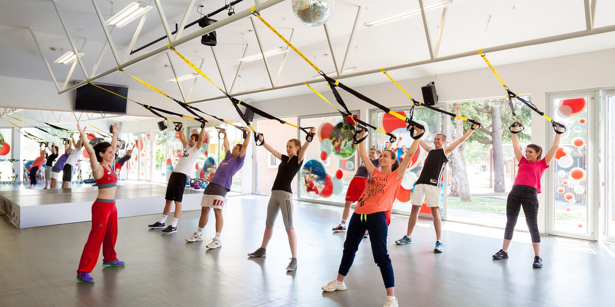 a group of people working out in a gym