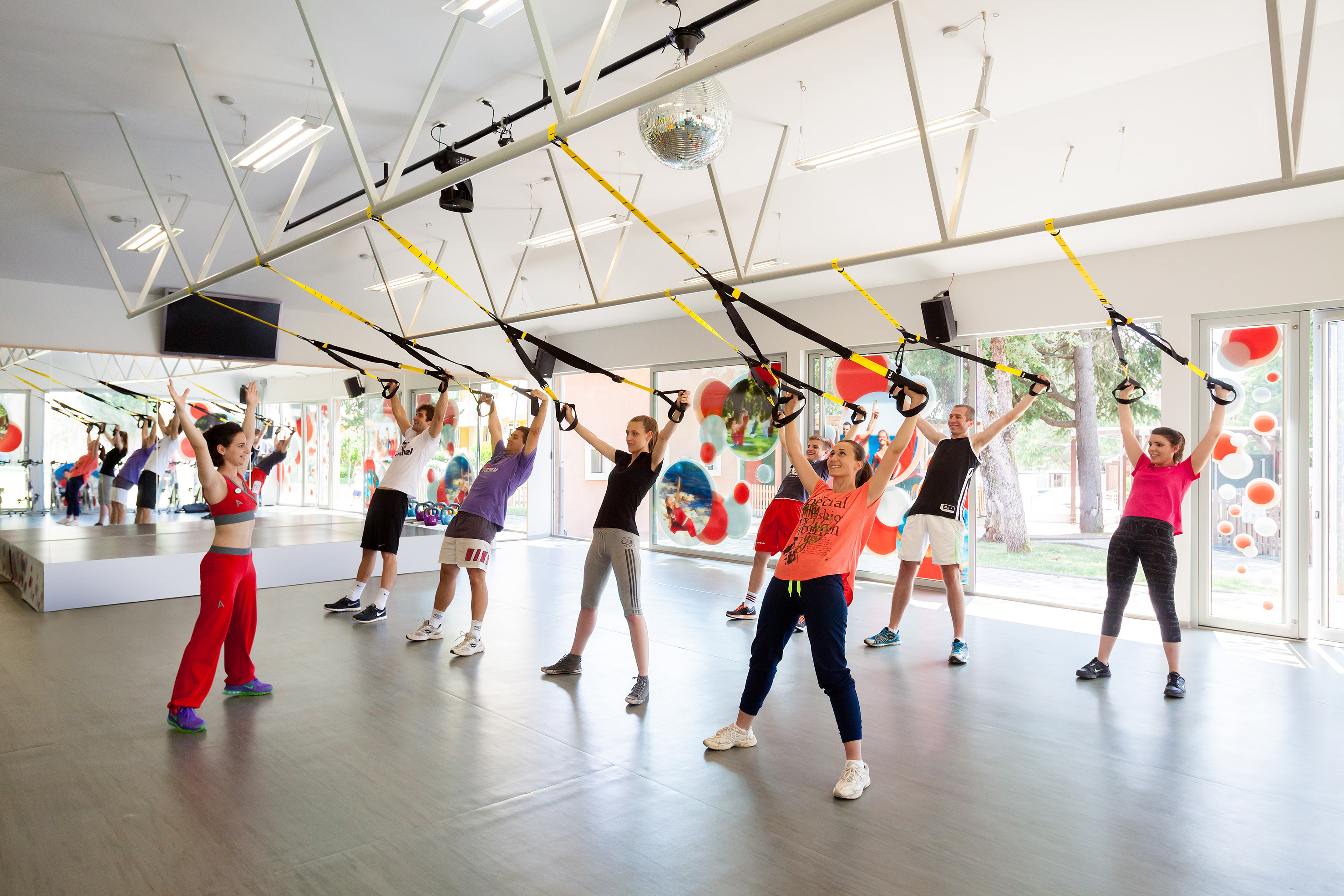 a group of people working out in a gym