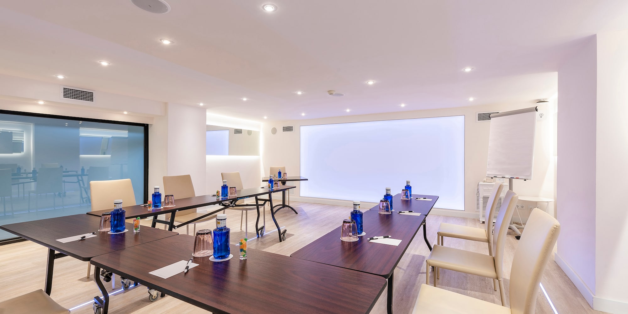 a room with tables and chairs