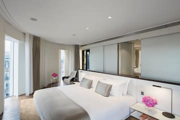 a bedroom with a large bed