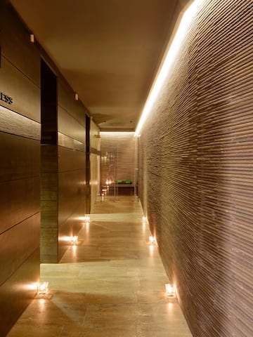 a hallway with lit up walls