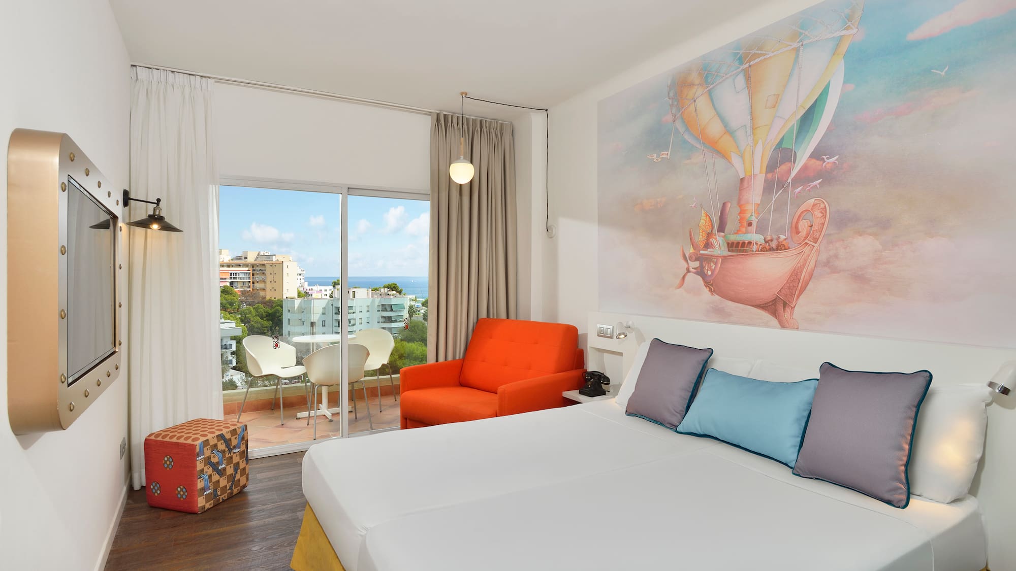 a room with a bed and a chair