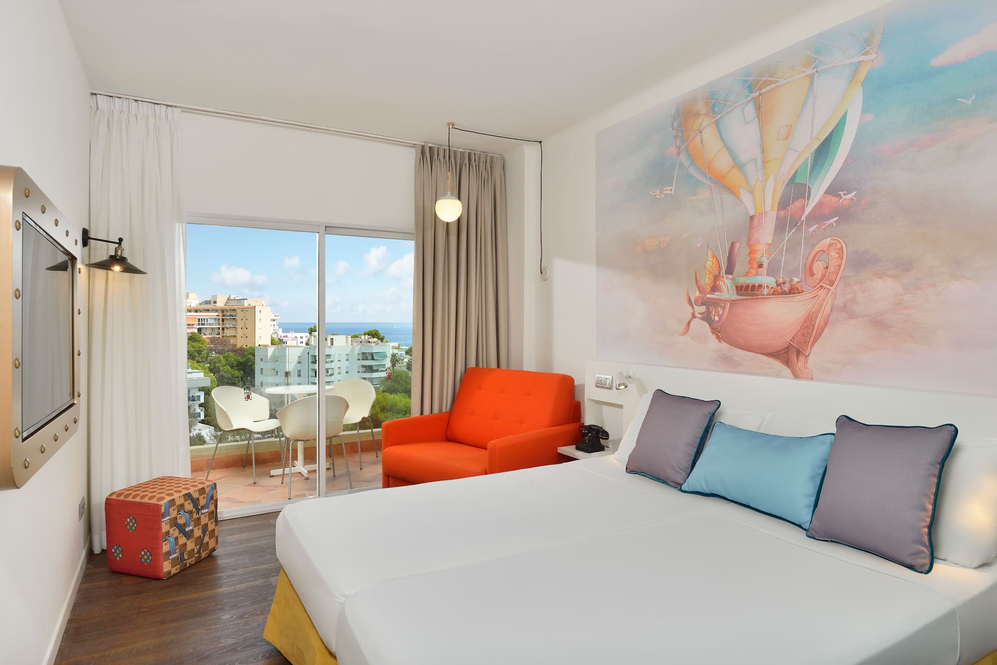 a room with a bed and a chair