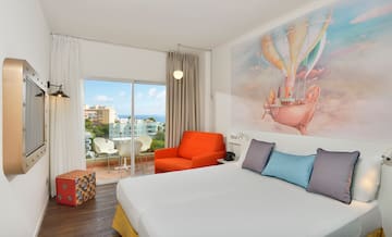 a room with a bed and a chair