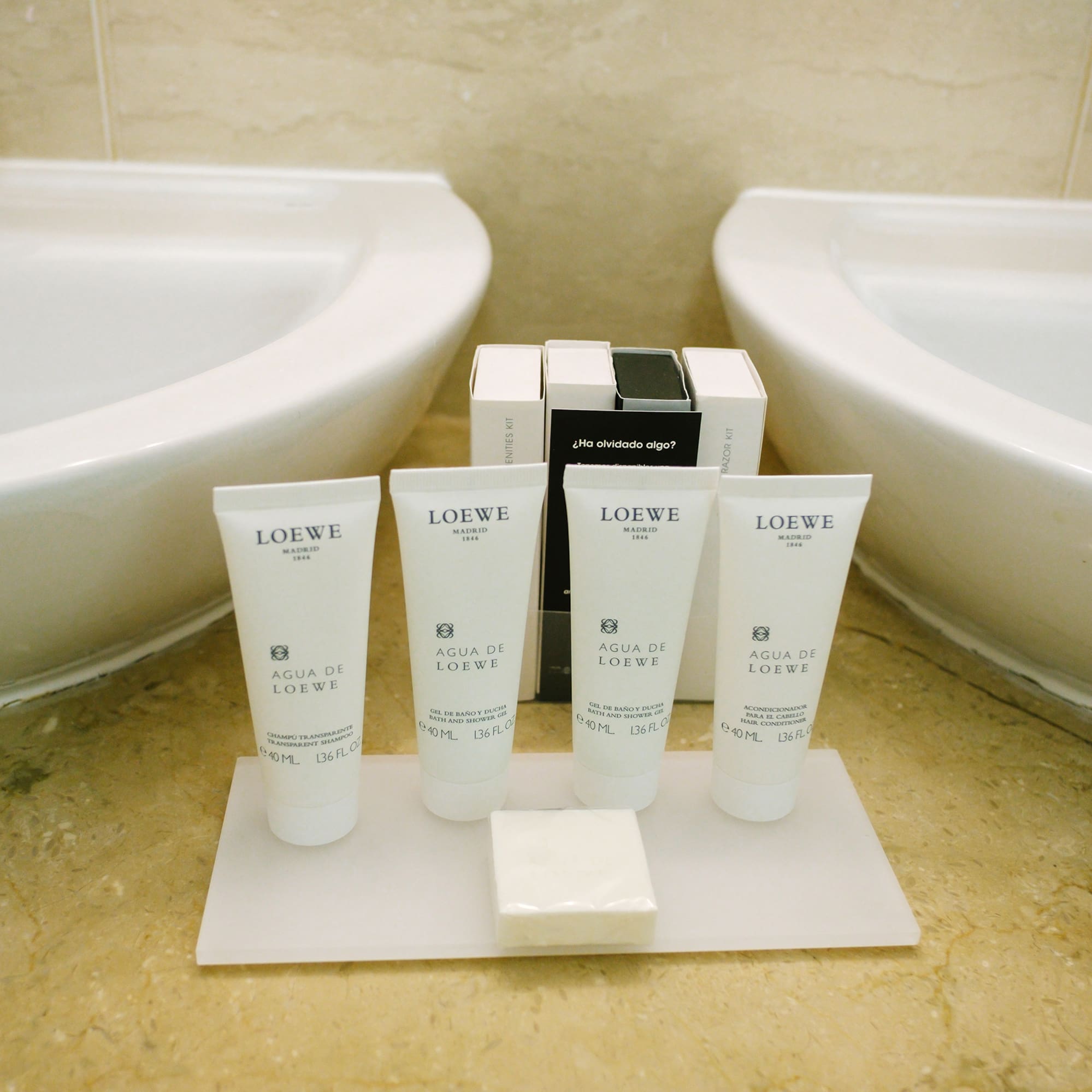 a group of white containers on a white surface