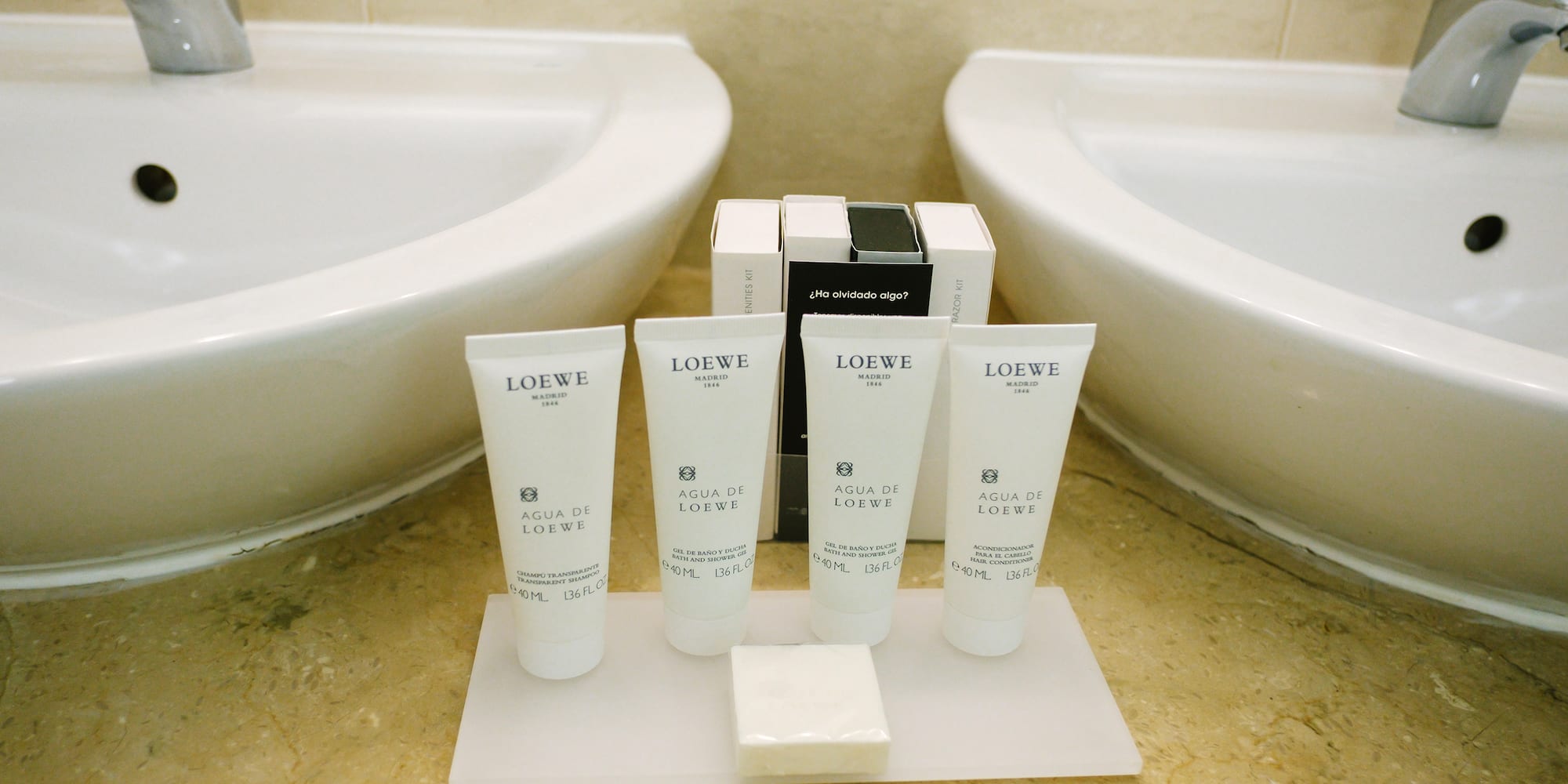 a group of white containers on a white surface